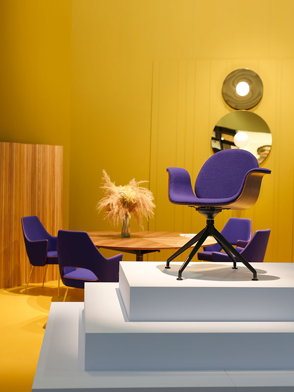 Sthlm-fair-yellow-wall-purple-chairs.jpg